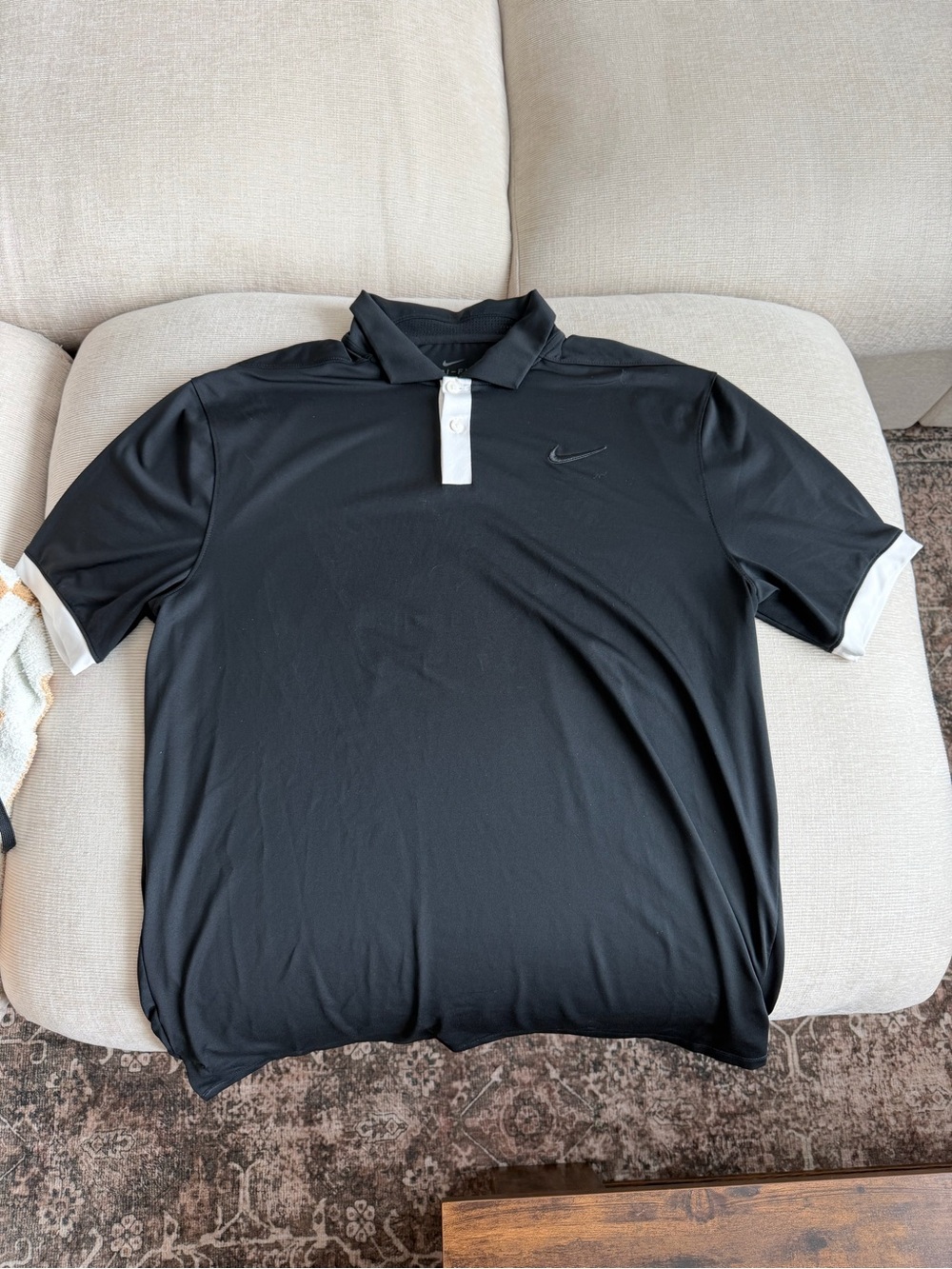 Nike Men's Black Polo with White Placket and Cuff Accents